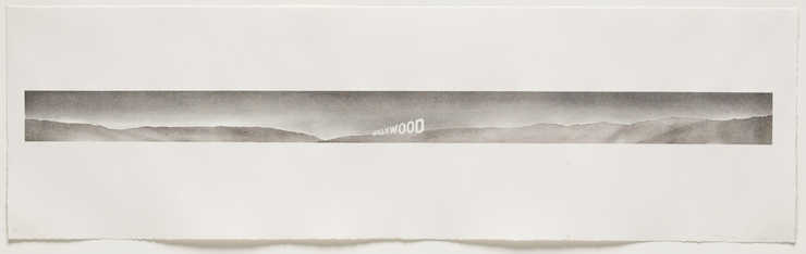 a black and white image of the Hollywood sign