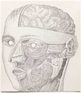 black printing on white paper. A mask with eyeholes  punched out.