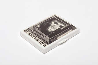 .1 - A white plastic box with a Maciunas-designed label attached to the lid.  .2 - A mirror is...