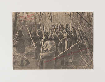 black, white and red print, depicting beuys and participants of an environmental protection action