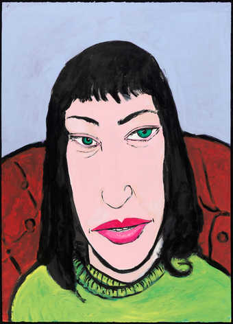 An image of a seated woman (Julie Hill).