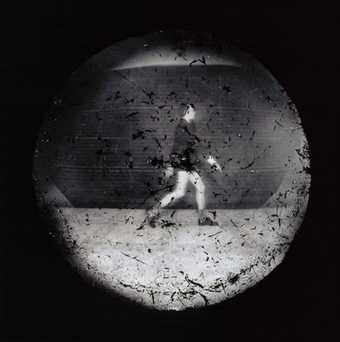 photographs taken of a man walking with no pants on, using laundry machines as cameras and...