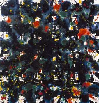 large canvas spattered with bright colors over a grid of blue squares