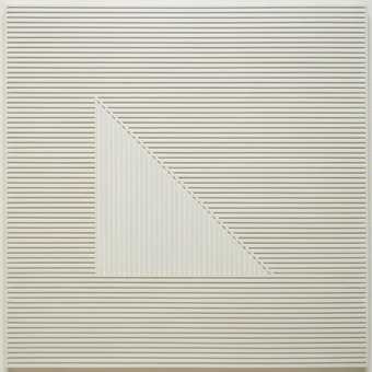 white wood panel with attached strips of wood that form a triangle shape