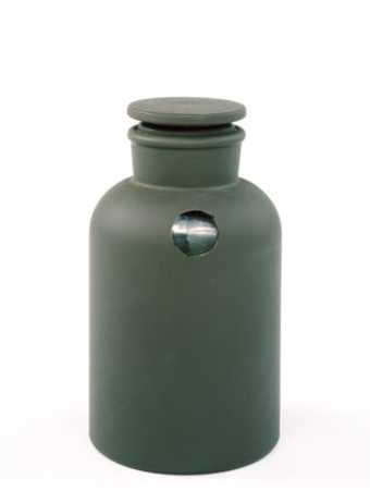 Glass bottle painted brown, with mirrored interior, and cylindrical cardboard box.  Complete...