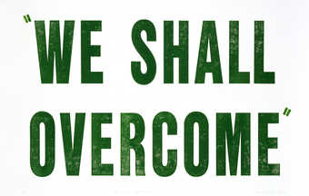 The words "WE SHALL OVERCOME" printed in green ink from a rubber stamp.  From a suite...