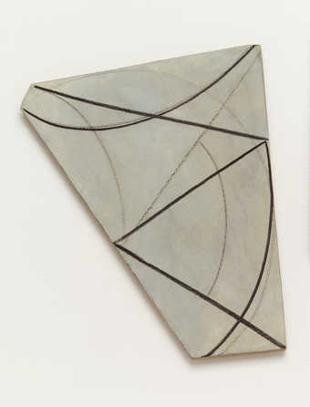 Shaped piece painted light blue with black lines forming geometric shapes.