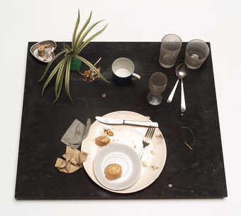 The remnants of a meal eaten by Bruce Conner in 1964