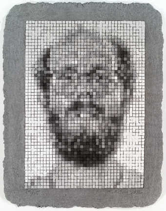 a monochrome self portrait broken in a grid of squares