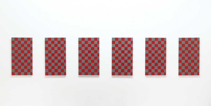 six aluminum panels painted checkerboard pattern with red and grey.