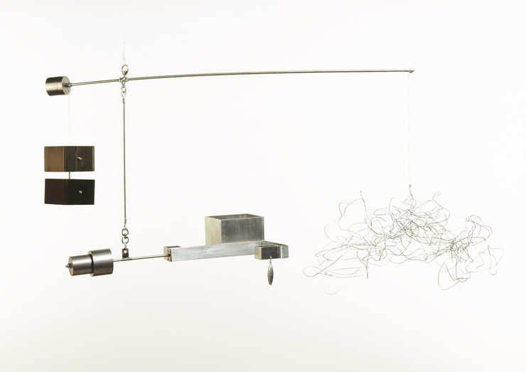 A mobile, based on the drawing of the floor and site plans of a school that the artist attended.