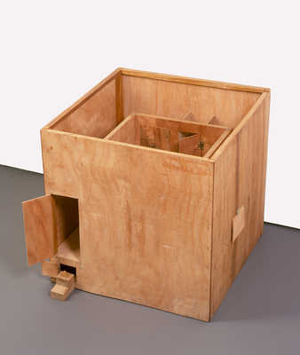 A wooden model of a room