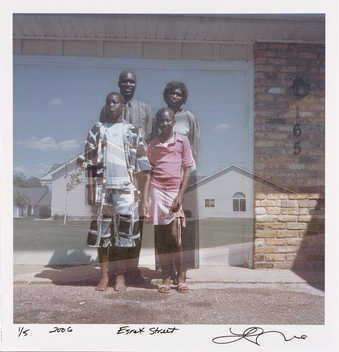 A double exposure type image of a family of four and a suburban house.