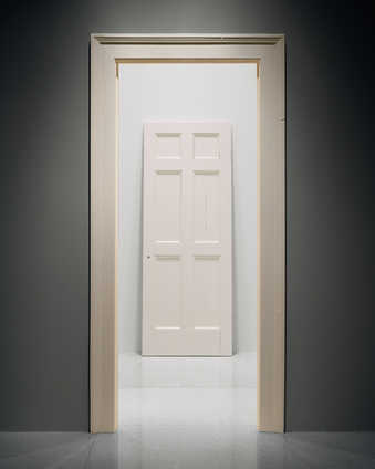 A six panel door and door frame.