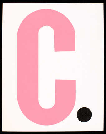Pink and black print on white card stock; text is in Spanish. Printed both sides. Front has large...