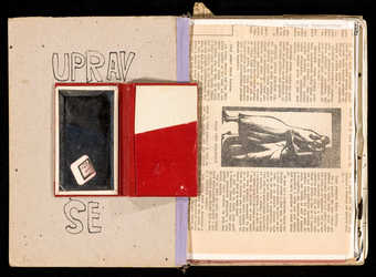 An artist's book with paperboard cover.  Contains: photographs, mirror, map of Prague,...