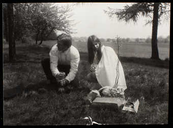 (.1)Handwritten text in English for "wedding event " (green paper, blue ink), (.2)black...